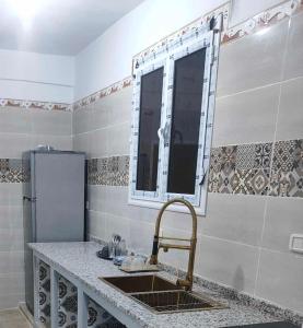 Köök või kööginurk majutusasutuses Appart spacieux douz