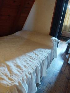 Giường trong phòng chung tại Altos del torreón