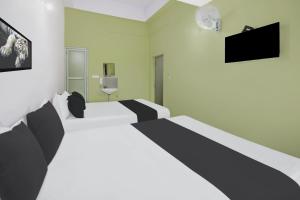 Φωτογραφία από το άλμπουμ του Hotel O ISIRI Rooms σε Mysore