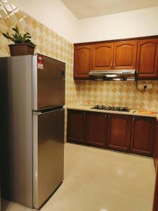 Kuchyň nebo kuchyňský kout v ubytování Batu Ferringhi 180 Seaview High Floot 高楼全海景房