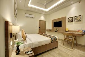 Giường trong phòng chung tại Hotel King Plaza
