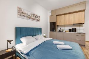 En eller flere senge i et værelse på Bemovia House