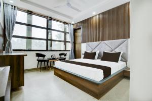 Ένα ή περισσότερα κρεβάτια σε δωμάτιο στο Hotel O Platinum