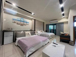 Voodi või voodid majutusasutuse 鹿港春天Spring B&B toas