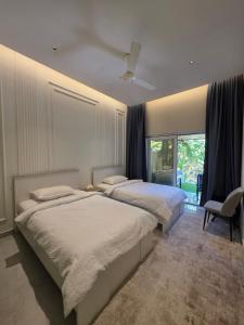 Ένα ή περισσότερα κρεβάτια σε δωμάτιο στο شاليه ميلان Milan Chalet +37 φωτογραφίες