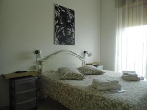 Ένα ή περισσότερα κρεβάτια σε δωμάτιο στο Suite 7