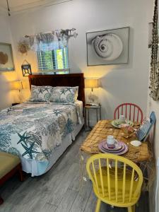 Ένα ή περισσότερα κρεβάτια σε δωμάτιο στο Sea Shells