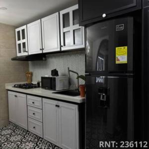 Una cocina o cocineta en Apartaestudio Harry Potter