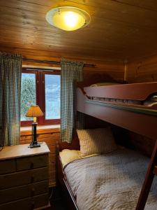 Кровать или кровати в номере Beautiful Cabin With Infrared Sauna in Myrkdalen