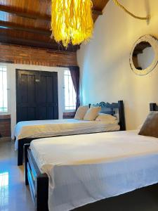 Ένα ή περισσότερα κρεβάτια σε δωμάτιο στο Casa Privada Centro