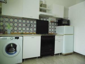 Η κουζίνα ή μικρή κουζίνα στο Suite 7