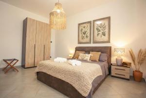 Ένα ή περισσότερα κρεβάτια σε δωμάτιο στο B&B Machiavelli