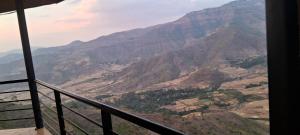 a view of a mountain range from a lookout tower at Lalibela Circle Guest House in Lalibela