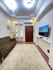 TV a/nebo společenská místnost v ubytování IF Homestay Mersing