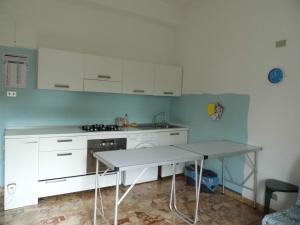 Η κουζίνα ή μικρή κουζίνα στο Suite 7 +11 φωτογραφίες