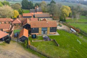 Un jardín fuera de An elegant countryside hideaway with four indulgent ensuite bedrooms