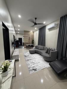Χώρος καθιστικού στο Homestay Rawang, Sg Choh