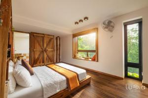 Ένα ή περισσότερα κρεβάτια σε δωμάτιο στο LUMA House