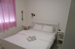 Postel nebo postele na pokoji v ubytování סויטות הר וים + 18 fotografií