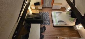 an overhead view of a living room with a couch at Ferienwohnung "Dachblick" Bad Elster in Bad Elster