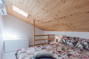 Postel nebo postele na pokoji v ubytování Casa Giusi Terrace & Charm by Wonderful Italy