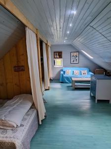 Ένα ή περισσότερα κρεβάτια σε δωμάτιο στο Bergerie Secrète, un Havre de Paix