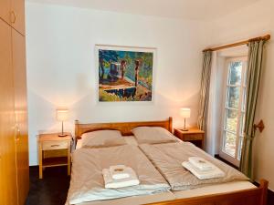 Ένα ή περισσότερα κρεβάτια σε δωμάτιο στο Pension Hessbögel