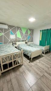 Ένα ή περισσότερα κρεβάτια σε δωμάτιο στο Finca La Sile