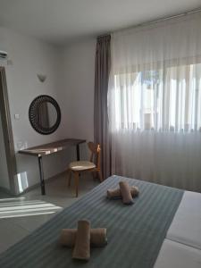 Ένα ή περισσότερα κρεβάτια σε δωμάτιο στο Electra Beach Holiday Village