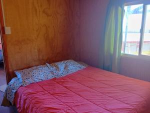 Ένα ή περισσότερα κρεβάτια σε δωμάτιο στο Alto de Pucatrihue