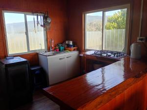 Η κουζίνα ή μικρή κουζίνα στο Alto de Pucatrihue