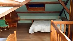 Ένα ή περισσότερα κρεβάτια σε δωμάτιο στο Gite La Bélugue À Ste-enimie