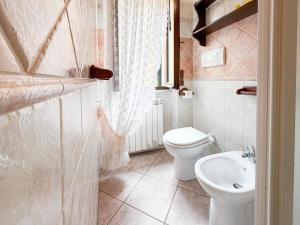 Koupelna v ubytování Tra Tetti e Mare - HelloElba + 7 fotografií