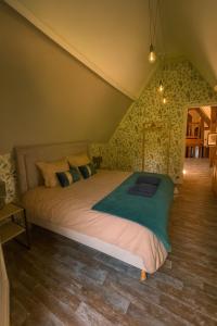 Voodi või voodid majutusasutuse Le Hameau des Prés-Verts, un séjour détente et bien être pour les amoureux de la nature au cœur du Pays d'Auge, en Normandie toas