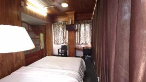 Postel nebo postele na pokoji v ubytování Rainbow Homestay Wayanad + 44 fotografií