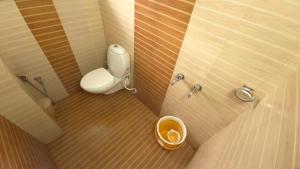 Koupelna v ubytování Rainbow Homestay Wayanad