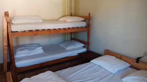 Ένα ή περισσότερα κρεβάτια σε δωμάτιο στο Appartement confortable à La Bresse avec terrasse