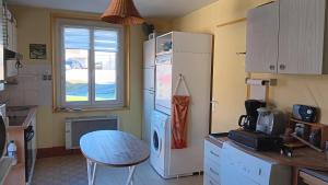 Η κουζίνα ή μικρή κουζίνα στο Appartement confortable à La Bresse avec terrasse