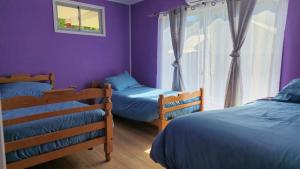 Ένα ή περισσότερα κρεβάτια σε δωμάτιο στο Camping & Hospedaje Rio Laja +43 φωτογραφίες