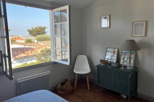 Billede fra billedgalleriet på Apartment with sea view parking garden and beach access i La Flotte + 16 billeder