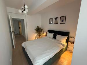 Postel nebo postele na pokoji v ubytování V25Appartments Cozy