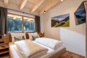 Postel nebo postele na pokoji v ubytování Boderhof Apartments + 64 fotografií