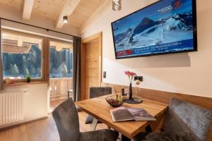 TV a/nebo společenská místnost v ubytování Boderhof Apartments