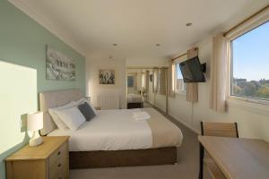 TV/trung tâm giải trí tại Cecil Court Hotel +24 ảnh