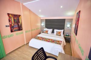 Voodi või voodid majutusasutuse Encanto Lodge toas +15 fotot