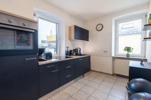 Kuchyň nebo kuchyňský kout v ubytování Basalt-Suite