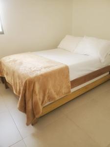 En eller flere senge i et værelse på APTO CARTAGENA DE INDIAS Marbella