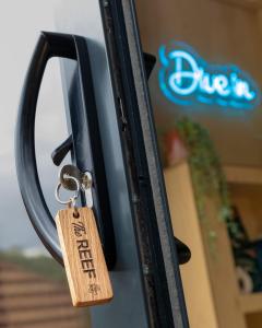 Un certificado, premio, letrero u otro documento en The Reef - Unique Hot Tub Cabin in Millport