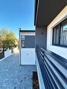 a door on the side of a building at Forest Lux Apartman in Odorheiu Secuiesc