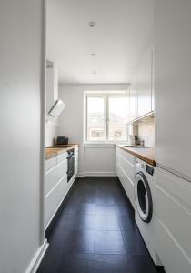 Una cocina o cocineta en Fantastic 2-BR w balcony in Charlottenlund - 294